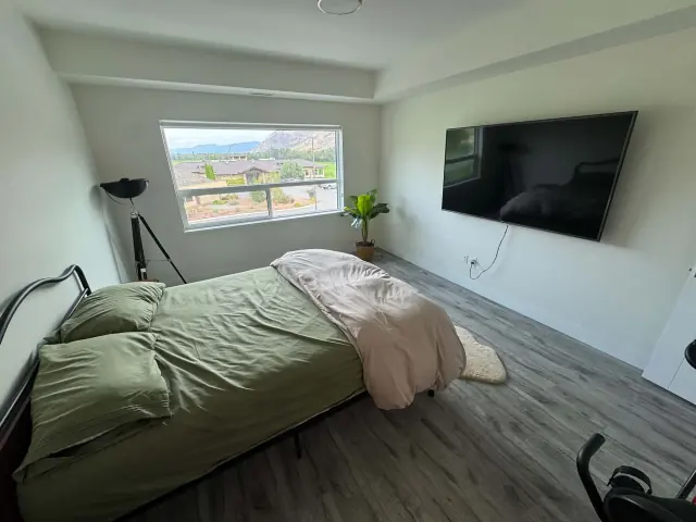 Bedroom with clean floors and clear surfaces in a Kamloops home